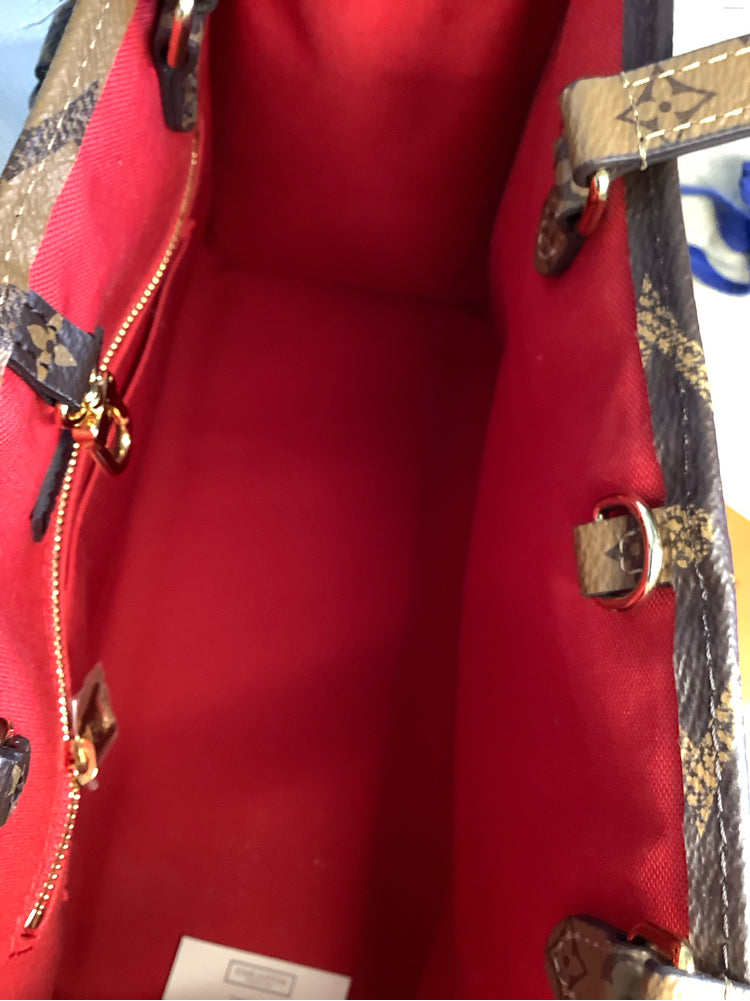 Louis Vuitton Monogram OnTheGo MM Handbags