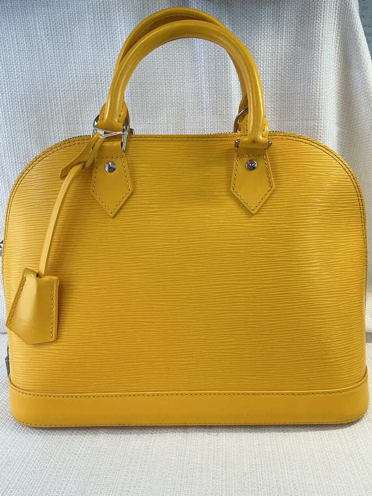 Louis Vuitton Yellow Alma Handbags