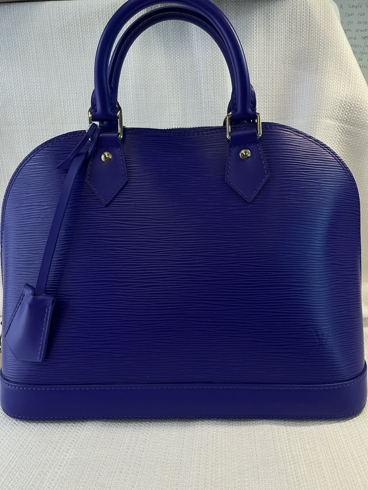 Louis Vuitton Purple alaia Handbags